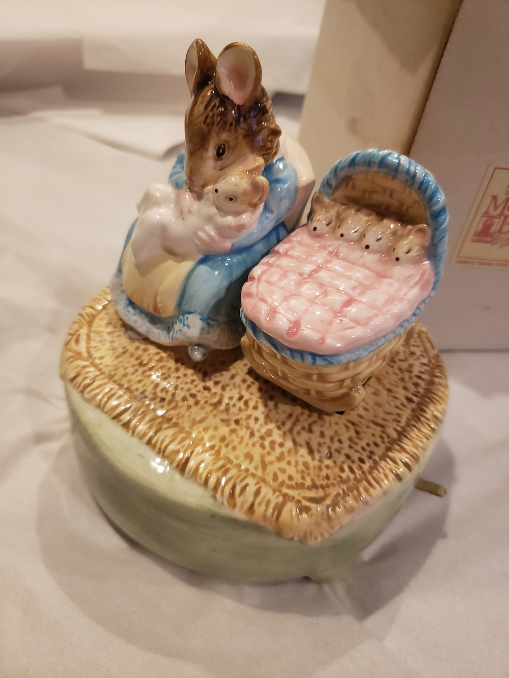 Beatrix Potter Porcelain Bunny Mother and Cradle Music Box in Blue and Pink